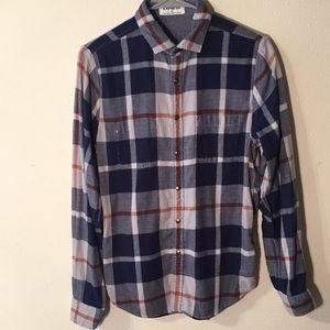 Reversible snap button down flannel shirt.
